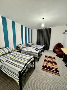 Postel nebo postele na pokoji v ubytování Euphoria guest house