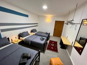 Postel nebo postele na pokoji v ubytování Euphoria guest house