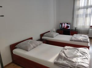 Postel nebo postele na pokoji v ubytování Hostel 36