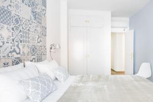 Postel nebo postele na pokoji v ubytování 'Montano Three' Center by ELE Apartments