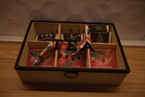 a box filled withiazepines and other items on a table at Apartman Iskra in Trebinje