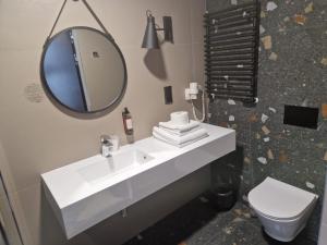 Koupelna v ubytování Biala Perla Sunny Mountain 601 + 14 fotografií