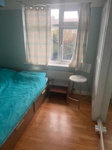 Letto o letti in una camera di Double Rooms in Shared Home