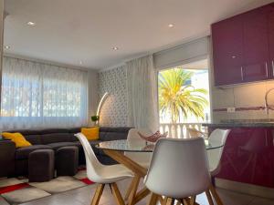 A seating area at Relax and enjoy with a view of El Teide and sea
