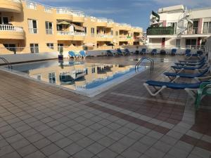 The swimming pool at or close to Relax and enjoy with a view of El Teide and sea