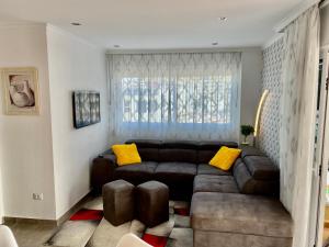 A seating area at Relax and enjoy with a view of El Teide and sea