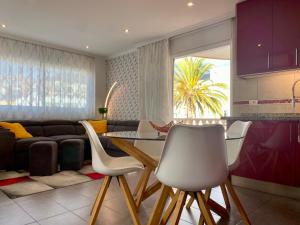 A seating area at Relax and enjoy with a view of El Teide and sea