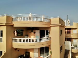 A balcony or terrace at Relax and enjoy with a view of El Teide and sea