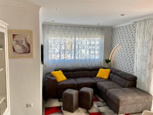 A seating area at Relax and enjoy with a view of El Teide and sea