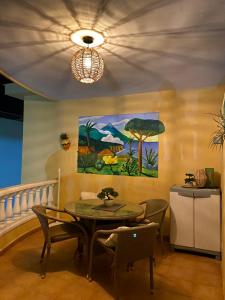 A seating area at Relax and enjoy with a view of El Teide and sea
