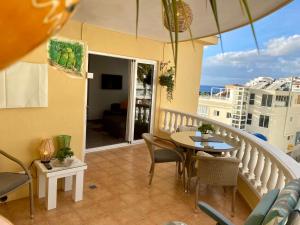 A balcony or terrace at Relax and enjoy with a view of El Teide and sea