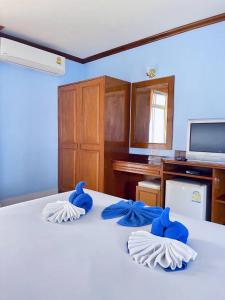 Posteľ alebo postele v izbe v ubytovaní Innarm House Patong
