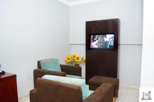 TV a/nebo společenská místnost v ubytování Mendiata Hotel