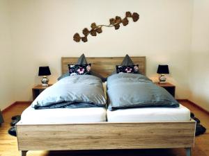 Postelja oz. postelje v sobi nastanitve Familien-Apartment SchmitTs Katz