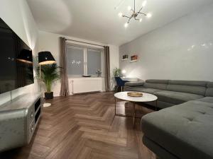 Posezení v ubytování EXKLUSIVE 2 Zimmer EG Wohnung mit Balkon in Top Lage!