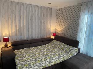 A bed or beds in a room at Relax and enjoy with a view of El Teide and sea
