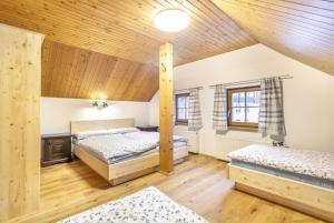 Posteľ alebo postele v izbe v ubytovaní Ferienhaus Alte Mühle Hohentauern