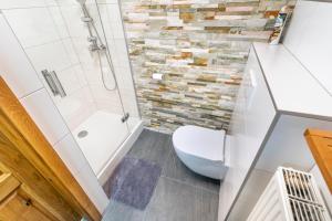Kúpeľňa v ubytovaní Ferienhaus Alte Mühle Hohentauern