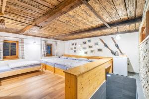 Posteľ alebo postele v izbe v ubytovaní Ferienhaus Alte Mühle Hohentauern
