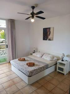 Posteľ alebo postele v izbe v ubytovaní Casa de Simo · Sol, Relax y diversión