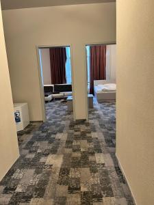 Postel nebo postele na pokoji v ubytování Albert Hotel