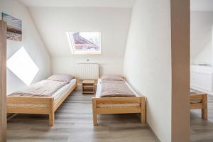 Postel nebo postele na pokoji v ubytování K 357 - Low budget Hotel in Ratekau bei Lübeck