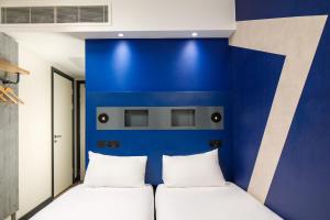 ibis budget Manchester Airport T2客房内的一张或多张床位