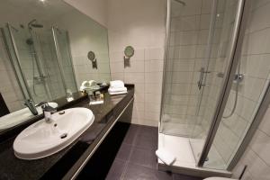 Koupelna v ubytování Hotel Eyberg + 14 fotografií