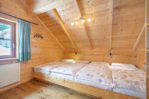 Posteľ alebo postele v izbe v ubytovaní Veselý Svišť Chalet Lachtal