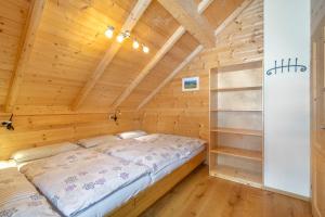 Posteľ alebo postele v izbe v ubytovaní Veselý Svišť Chalet Lachtal