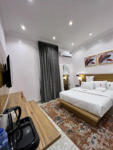 A bed or beds in a room at Bricks Residence