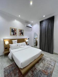 A bed or beds in a room at Bricks Residence