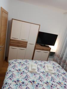 Vuode tai vuoteita majoituspaikassa Apartman Meseceva dolina