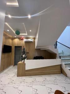a lobby with a reception desk in a building at Bricks Residence in Lekki