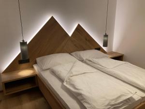 Letto o letti in una camera di das MARX - Gasthof Marx - Apartments