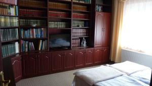 Posteľ alebo postele v izbe v ubytovaní Somogyi Apartmanház