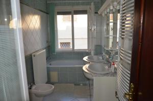 Kúpeľňa v ubytovaní Somogyi Apartmanház