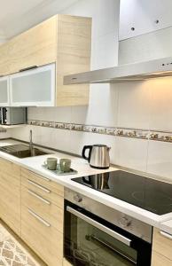 Kuchyň nebo kuchyňský kout v ubytování Confortable apartamento en pueblo costero