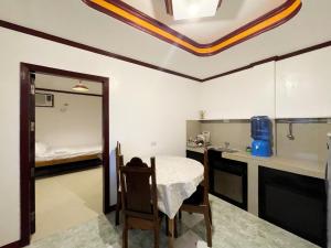 Kuchyň nebo kuchyňský kout v ubytování Lara's Guesthouse Siargao
