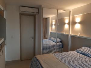 Katil atau katil-katil dalam bilik di Flat com vista panorâmica na melhor localização