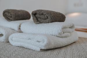 A bed or beds in a room at Serifos Sugar Cubes
