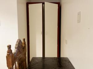 Postel nebo postele na pokoji v ubytování Lara's Guesthouse Siargao