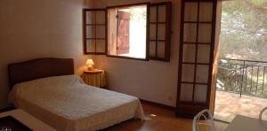 Postel nebo postele na pokoji v ubytování Motel Logis d'Abartello