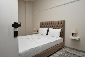 Postel nebo postele na pokoji v ubytování Central cozy apartment