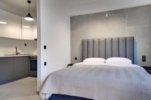 Posteľ alebo postele v izbe v ubytovaní MyPLACE Premium Apartments