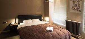 Postel nebo postele na pokoji v ubytování Hotel Ambasador