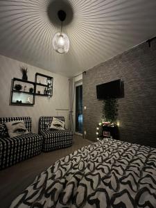 Postel nebo postele na pokoji v ubytování NEW Nelis Apartment Klínovec