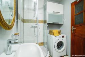 Kúpeľňa v ubytovaní Apartament na Traugutta + 2 fotografie