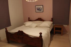 Postel nebo postele na pokoji v ubytování Villa Koivula