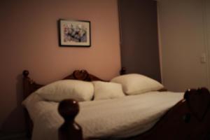 Postel nebo postele na pokoji v ubytování Villa Koivula